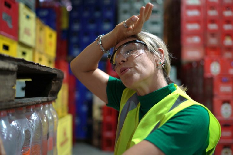 Exhausted employee at warehouse