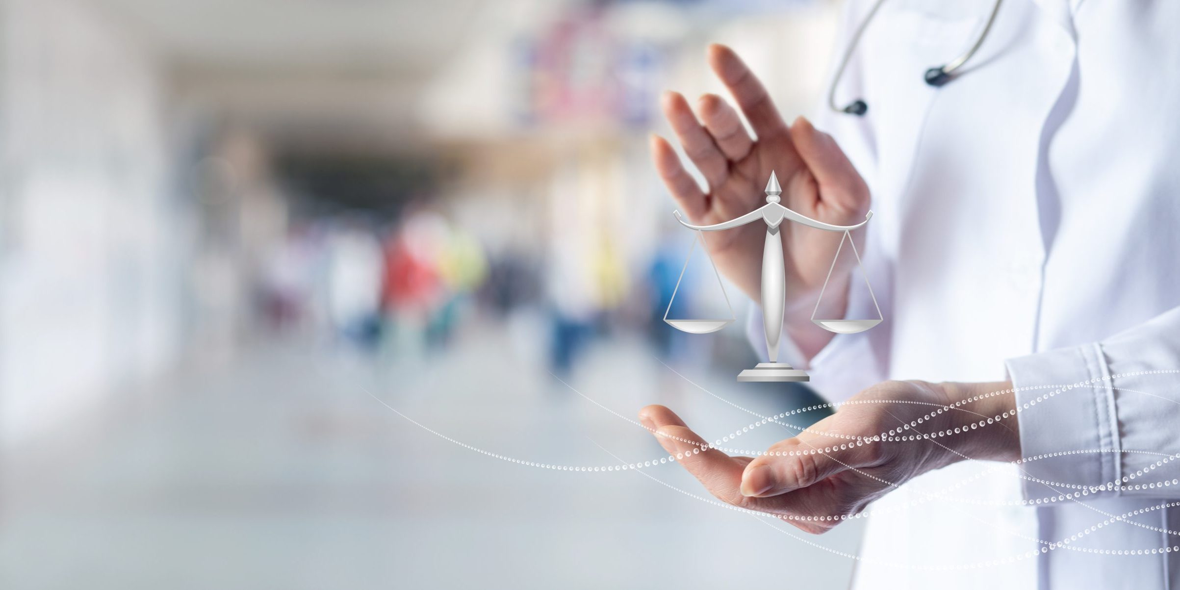 Doctor shows scales of justice.